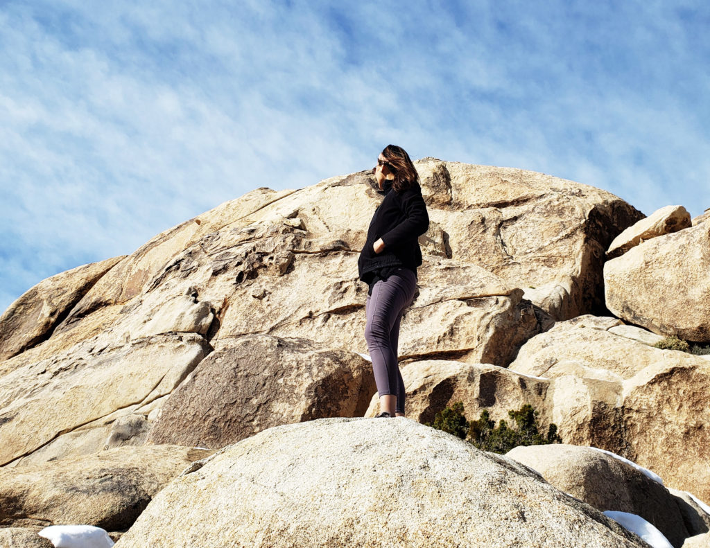 Naturally Tessa on the boulder at Joshua Tree National Park during the winter.